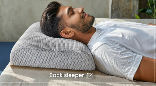 A person smiling and waking up refreshed without neck pain.