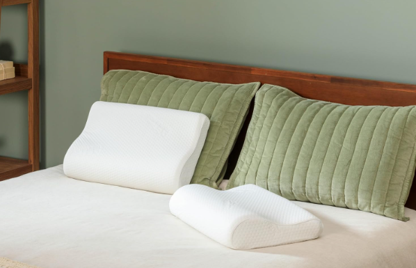 Old lumpy pillow versus new supportive pillow