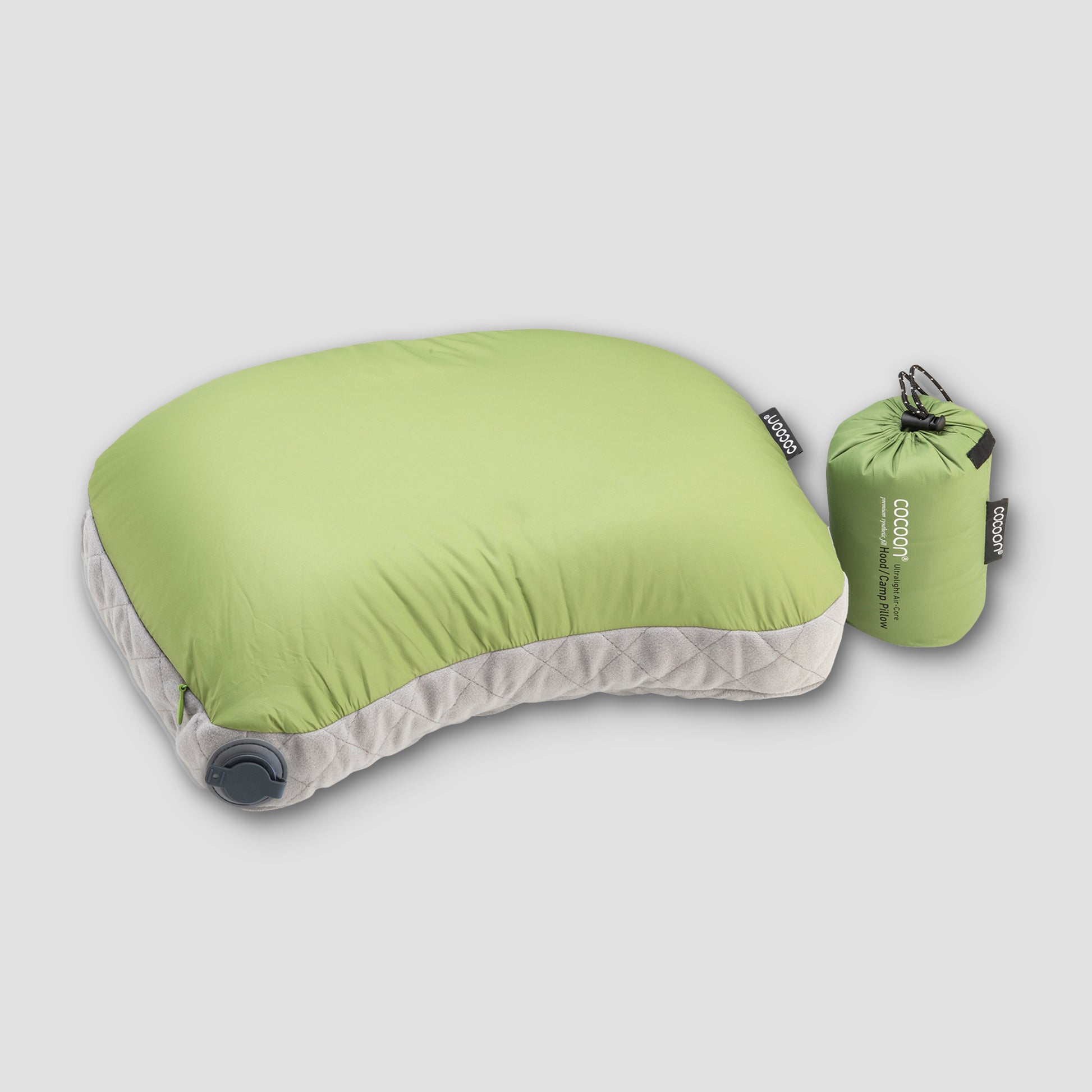 Air-core camping pillow shown beside its compact storage sack