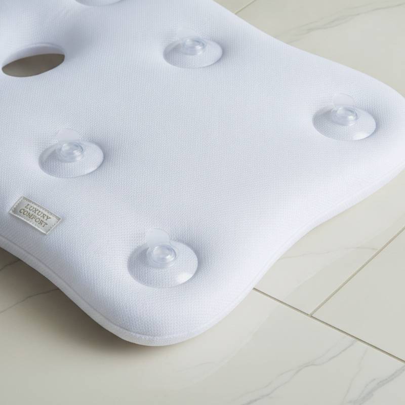 Demonstration of strong suction cups on the back of a bath pillow
