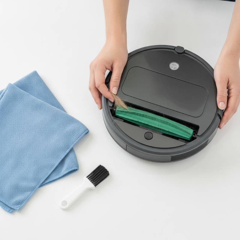 Cleaning the rubber rollers and sensors of an iRobot Roomba